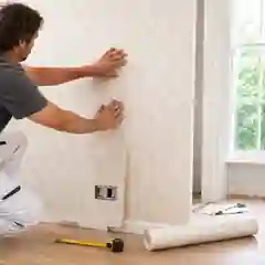 Wallpaper rolls and extra material allowed for trimming and pattern matching